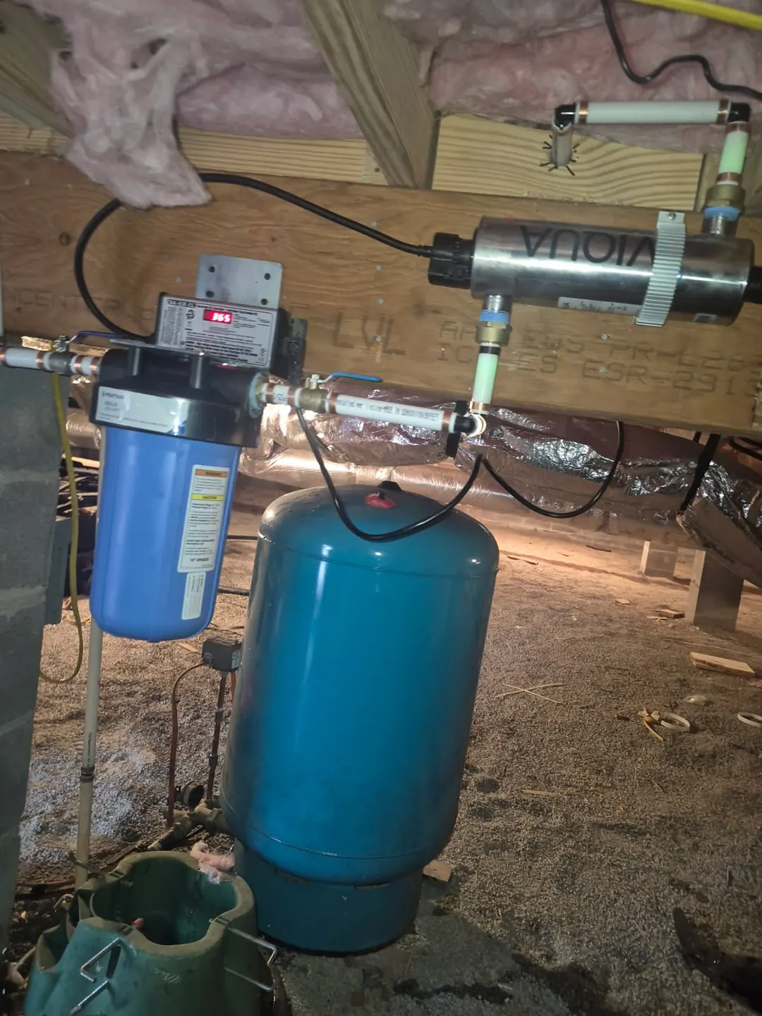 UV unit with its controller and a cartridge filter in a crawlspace